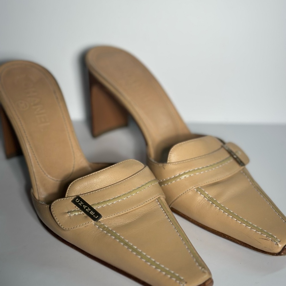 CHANEL Beige Leather Heeled Mules with Gold Logo Plaque